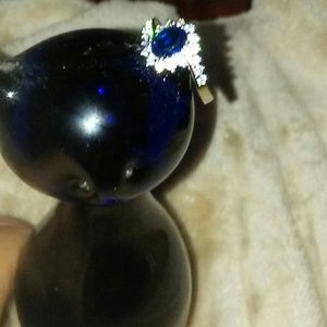 Beautiful silver colored ring with blue stone